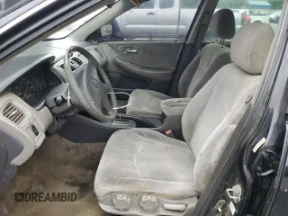 2001 Honda Accord LX z VIN 1HGCG66561A021253, wystawiony jako Copart lot #51798985 z przebiegiem Nie podano mil oraz Szkoda całkowita • Salvage title. Historia ofert i sprzedaży dostępna na DreamBid. Obrazek 7.