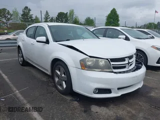 2013 Dodge Avenger SXT with VIN 1C3CDZCG9DN772959, listed as a IAAI auction lot 41971187 with 121,530 mi miles and . Bid and sale history available at carsss.com. Image 1.
