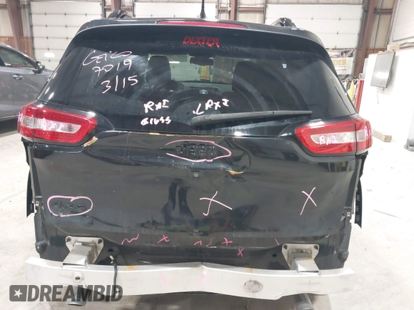 2014 Jeep Cherokee Latitude with VIN 1C4PJMCS6EW299532, listed as a IAAI auction lot 41833888 with 199,915 mi miles and . Bid and sale history available at DreamBid. Image 6.