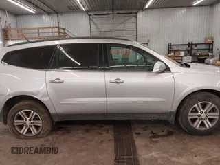 2015 Chevrolet Traverse LT with VIN 1GNKVHKD4FJ305990, listed as a IAAI auction lot 41441938 with 203,877 mi miles and . Bid and sale history available at DreamBid. Image 14.