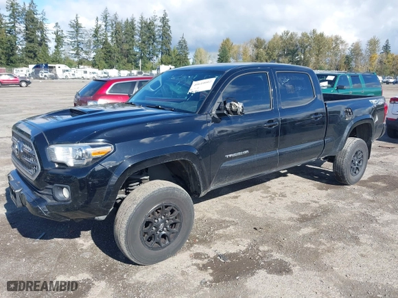 2016 Toyota Tacoma SR5 with VIN 5TFDZ5BN7GX001869, listed as a IAAI auction lot 40610002 with 184,380 mi miles. Bid and sale history available at carsss.com. Image 17.