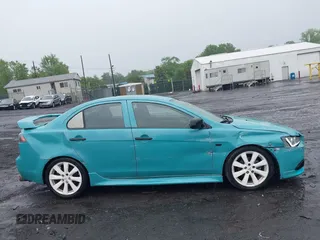 2013 Mitsubishi Lancer GT with VIN JA32U8FW6DU022878, listed as a IAAI auction lot 42449708 with 121,869 mi miles and . Bid and sale history available at DreamBid. Image 13.