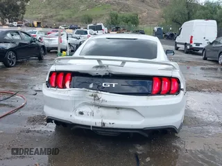 2018 Ford Mustang GT z VIN 1FA6P8CF5J5154590, wystawiony jako IAAI lot #41588857 z przebiegiem 113 805 mil mil oraz . Historia ofert i sprzedaży dostępna na DreamBid. Obrazek 15.