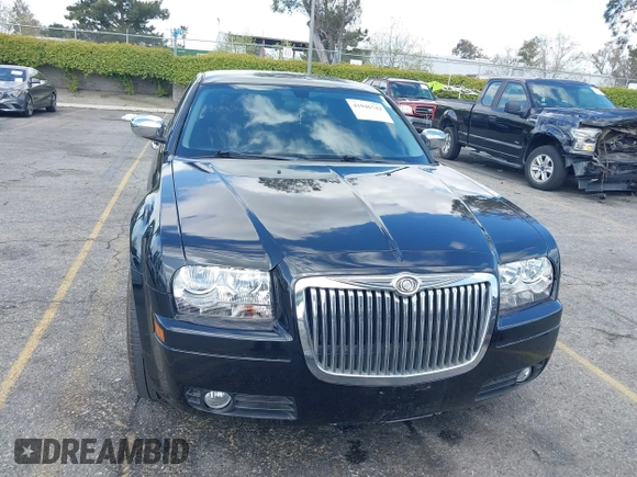 2007 Chrysler 300 with VIN 2C3KA43R57H852331, listed as a IAAI auction lot 41946742 with 211,168 mi miles. Bid and sale history available at carsss.com. Image 13.