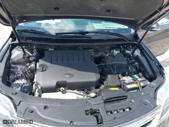 2014 Toyota Avalon Limited with VIN 4T1BK1EB3EU100754, listed as a IAAI auction lot 39446319 with 82,624 mi miles. Bid and sale history available at carsss.com. Image 10.