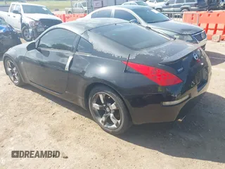 2006 Nissan 350Z Touring with VIN JN1AZ34D06M331061, listed as a IAAI auction lot 42544619 with 228,992 mi miles and . Bid and sale history available at DreamBid. Image 3.