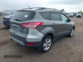 2014 Ford Escape SE with VIN 1FMCU9GX4EUA83808, listed as a IAAI auction lot 42576737 with 116,074 mi miles and . Bid and sale history available at DreamBid. Image 4.
