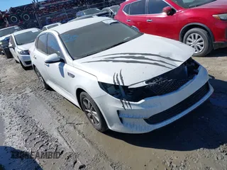 2016 Kia Optima LX with VIN KNAGT4L39G5073865, listed as a IAAI auction lot 41675211 with 120,751 mi miles. Bid and sale history available at carsss.com. Image 1.