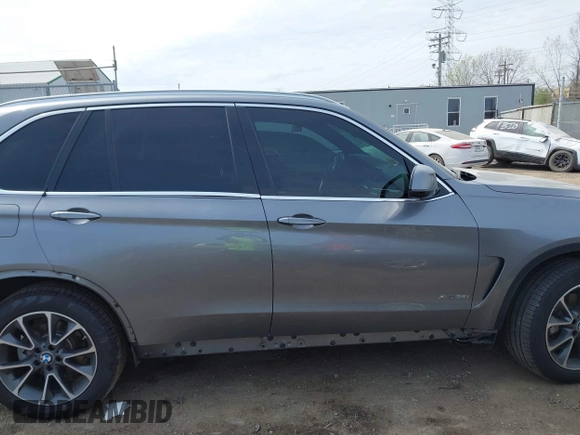 2017 BMW X5 xDrive35i with VIN 5UXKR0C33H0V81489, listed as a IAAI auction lot 42065076 with 65,900 mi miles and . Bid and sale history available at DreamBid. Image 14.