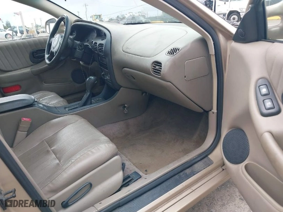 2003 Pontiac Grand Prix GT with VIN 1G2WP52K83F166466, listed as a IAAI auction lot 41932633 with 216,677 mi miles. Bid and sale history available at carsss.com. Image 5.