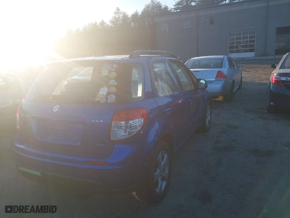 2012 Suzuki SX4 Crossover with VIN JS2YB5A34C6305897, listed as a IAAI auction lot 41176649 with 98,460 mi miles. Bid and sale history available at carsss.com. Image 4.