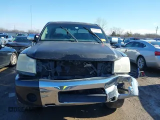 2004 Nissan Titan LE with VIN 1N6AA07A44N591357, listed as a IAAI auction lot 41464024 with 296,954 mi miles and . Bid and sale history available at DreamBid. Image 13.