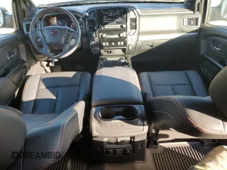 2024 Nissan Titan Pro-4X with VIN 1N6AA1ED6RN111104, listed as a Copart auction lot 46129425 with 4,903 mi miles and Salvage title. Bid and sale history available at DreamBid. Image 8.