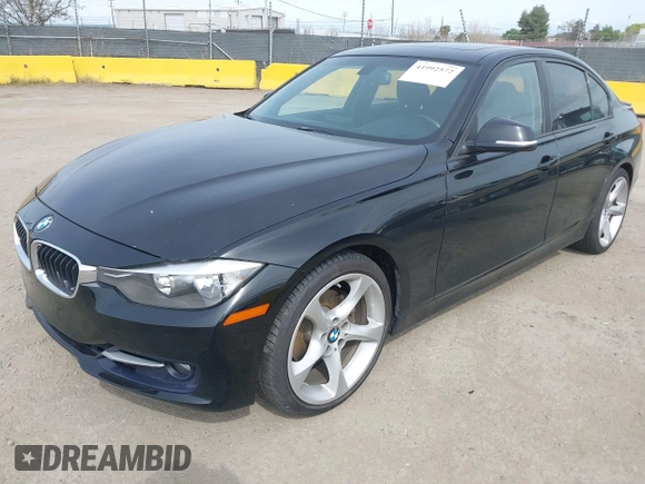 2012 BMW 3 Series 328i with VIN WBA3A5C56CF345904, listed as a IAAI auction lot 41992572 with 136,672 mi miles. Bid and sale history available at carsss.com. Image 2.