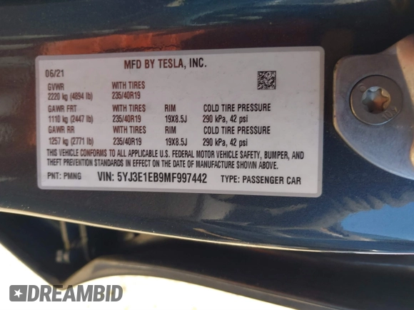 2021 Tesla Model 3 Long Range with VIN 5YJ3E1EB9MF997442, listed as a IAAI auction lot 41759875 with 87,059 mi miles. Bid and sale history available at carsss.com. Image 9.