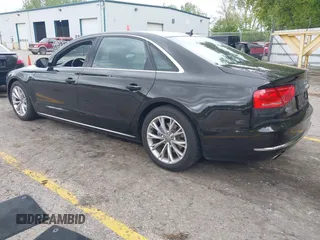 2013 Audi A8 3.0L с VIN WAURGAFD8DN012938, выставлен на аукционе IAAI как лот 42334901 с пробегом 64 235 миль миль и . История ставок и продаж доступна на DreamBid. Изображение 3.