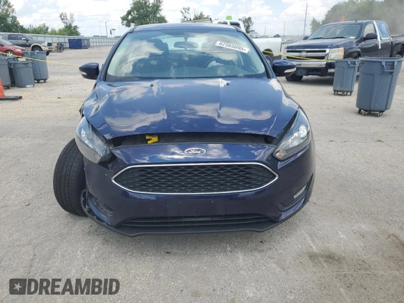 2016 Ford Focus SE z VIN 1FADP3F23GL288232, wystawiony jako Copart lot #62565095 z przebiegiem 11 634 mil mil oraz Szkoda całkowita • Salvage title. Historia ofert i sprzedaży dostępna na DreamBid. Obrazek 5.