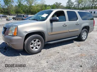 2007 GMC Yukon XL SLT z VIN 1GKFC16087J200390, wystawiony jako IAAI lot #42049673 z przebiegiem 169 174 mil mil oraz . Historia ofert i sprzedaży dostępna na DreamBid. Obrazek 2.