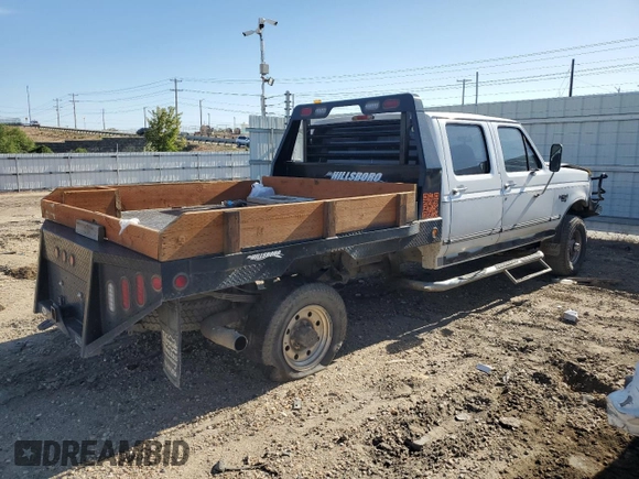 1997 Ford F-350 with VIN 1FTJW36F5VEA13739, listed as a Copart auction lot 56710615 with Not provided miles and Salvage title. Bid and sale history available at DreamBid. Image 3.