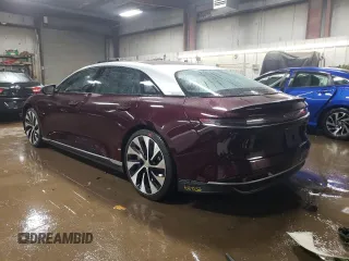 2022 Lucid Air Grand Touring z VIN 50EA1GBA0NA001260, wystawiony jako Copart lot #52131155 z przebiegiem 25 673 mil mil oraz Szkody całkowita. Historia ofert i sprzedaży dostępna na DreamBid. Obrazek 2.