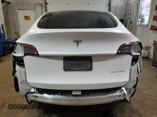 2023 Tesla Model Y Long Range z VIN 7SAYGDEE5PF619265, wystawiony jako Copart lot #48418655 z przebiegiem 42 233 mil mil oraz Szkoda całkowita • Salvage title. Historia ofert i sprzedaży dostępna na DreamBid. Obrazek 6.