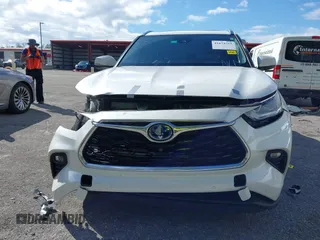 2021 Toyota Highlander Hybrid Limited with VIN 5TDYARAH2MS009326, listed as a IAAI auction lot 41674315 with 76,104 mi miles and . Bid and sale history available at DreamBid. Image 13.