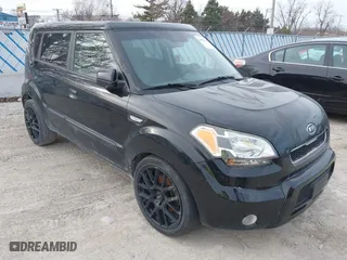 2010 Kia Soul + with VIN KNDJT2A28A7125814, listed as a IAAI auction lot 41808123 with 171,124 mi miles. Bid and sale history available at carsss.com. Image 1.