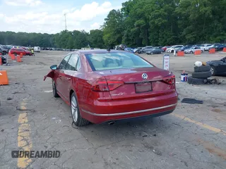 2017 Volkswagen Passat SE with VIN 1VWGT7A30HC058916, listed as a IAAI auction lot 42450554 with 82,960 mi miles and . Bid and sale history available at DreamBid. Image 3.