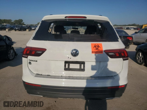2021 Volkswagen Tiguan S z VIN 3VV1B7AX1MM155177, wystawiony jako Copart lot #70585534 z przebiegiem Nie podano mil oraz Szkoda całkowita • Salvage title. Historia ofert i sprzedaży dostępna na DreamBid. Obrazek 6.