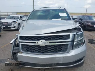 2016 Chevrolet Tahoe LS with VIN 1GNSCAEC2GR392937, listed as a IAAI auction lot 42648714 with 166,764 mi miles and . Bid and sale history available at DreamBid. Image 11.