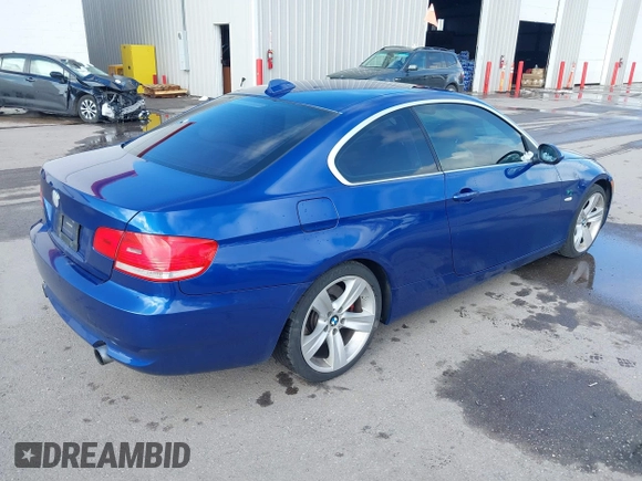 2007 BMW 3 Series 335i with VIN WBAWB73567P036617, listed as a IAAI auction lot 41618444 with 170,855 mi miles and . Bid and sale history available at DreamBid. Image 4.