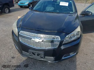 2013 Chevrolet Malibu LT with VIN 1G11E5SA6DF265901, listed as a IAAI auction lot 41971492 with 203,612 mi miles. Bid and sale history available at carsss.com. Image 6.