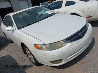 1999 Toyota Solara SE z VIN 2T1CF22P5XC129160, wystawiony jako IAAI lot #42404125 z przebiegiem 281 383 mil mil oraz . Historia ofert i sprzedaży dostępna na DreamBid. Obrazek 1.