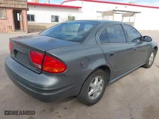 2004 Oldsmobile Alero GL1 with VIN 1G3NL52F84C124744, listed as a IAAI auction lot 41916407 with 164,660 mi miles. Bid and sale history available at carsss.com. Image 4.