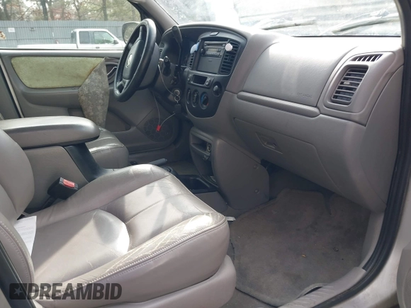 2001 Mazda Tribute LX with VIN 4F2YU08151KM06561, listed as a IAAI auction lot 41478779 with 54,826 mi miles and . Bid and sale history available at DreamBid. Image 5.