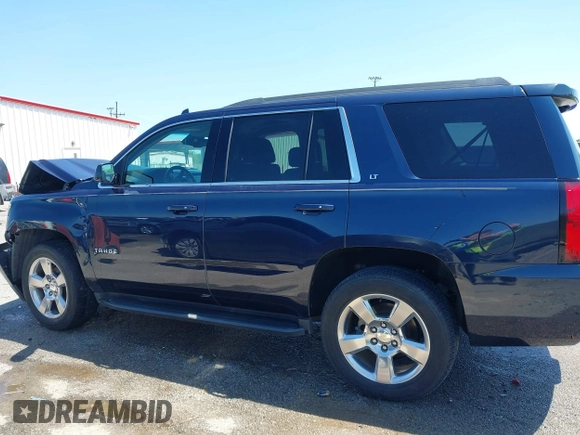 2018 Chevrolet Tahoe LT with VIN 1GNSCBKC0JR138385, listed as a IAAI auction lot 41977300 with 104,987 mi miles and . Bid and sale history available at DreamBid. Image 14.