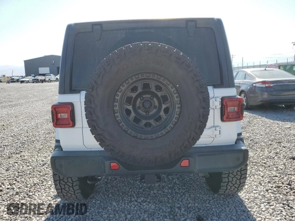 2018 Jeep Wrangler Unlimited Sahara with VIN 1C4HJXEG6JW112198, listed as a Copart auction lot 63412775 with 34,853 mi miles and Salvage title. Bid and sale history available at DreamBid. Image 6.