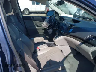 2013 Honda CR-V EX-L with VIN 2HKRM3H74DH513193, listed as a IAAI auction lot 41781093 with 94,003 mi miles and . Bid and sale history available at DreamBid. Image 5.