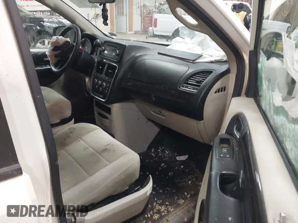 2012 Dodge Grand Caravan SXT with VIN 2C4RDGCG3CR405373, listed as a IAAI auction lot 41264407 with 164,019 mi miles and . Bid and sale history available at DreamBid. Image 5.