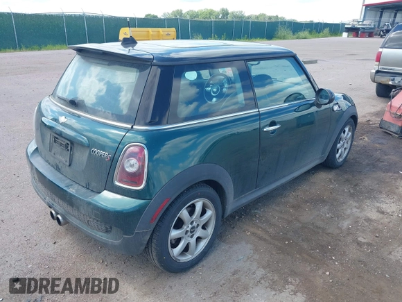 2009 MINI Hardtop S with VIN WMWMF73599TW83678, listed as a IAAI auction lot 42750705 with 95,278 mi miles and . Bid and sale history available at DreamBid. Image 4.