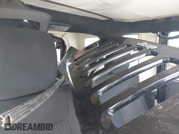 2011 Jeep Wrangler Unlimited Rubicon with VIN 1J4BA6H15BL580301, listed as a IAAI auction lot 42673014 with Not provided miles and . Bid and sale history available at DreamBid. Image 12.