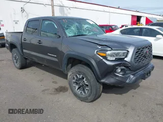 2020 Toyota Tacoma SR5 with VIN 3TMCZ5AN7LM321061, listed as a IAAI auction lot 41985533 with 32,111 mi miles and . Bid and sale history available at DreamBid. Image 1.
