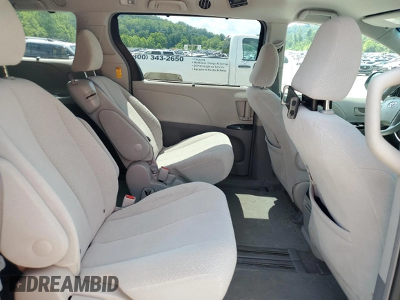 2014 Toyota Sienna LE AAS z VIN 5TDKK3DC8ES499949, wystawiony jako Copart lot #60346845 z przebiegiem 192 773 mil mil oraz Szkoda całkowita • Salvage title. Historia ofert i sprzedaży dostępna na DreamBid. Obrazek 11.
