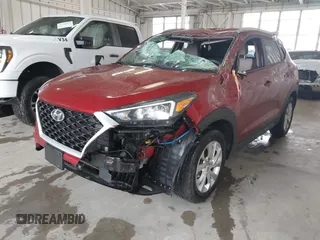 2021 Hyundai Tucson Value with VIN KM8J33A44MU363524, listed as a IAAI auction lot 41854508 with 59,821 mi miles. Bid and sale history available at carsss.com. Image 2.