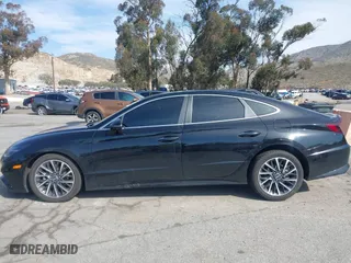 2023 Hyundai Sonata Limited with VIN KMHL34J28PA261498, listed as a IAAI auction lot 41598594 with 50,624 mi miles. Bid and sale history available at carsss.com. Image 14.