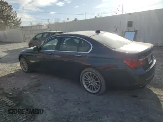 2013 BMW 7 Series 750i xDrive with VIN WBAYB6C50DD223786, listed as a Copart auction lot 87579345 with 143,523 mi miles and Salvage title. Bid and sale history available at DreamBid. Image 2.
