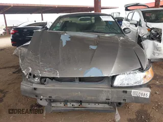 2002 Ford Mustang Standard z VIN 1FAFP40482F157569, wystawiony jako IAAI lot #42372535 z przebiegiem 76 944 mil mil oraz . Historia ofert i sprzedaży dostępna na DreamBid. Obrazek 12.
