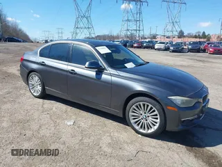 2012 BMW 3 Series 328i with VIN WBA3A5C53CF256338, listed as a IAAI auction lot 41758662 with 99,607 mi miles. Bid and sale history available at carsss.com. Image 1.