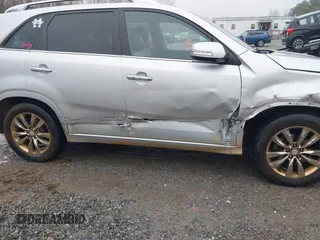 2013 Kia Sorento SX with VIN 5XYKWDA29DG342965, listed as a IAAI auction lot 41001039 with 163,760 mi miles. Bid and sale history available at carsss.com. Image 6.