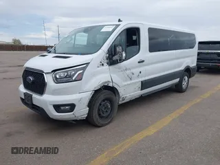 2023 Ford Transit Passenger XL with VIN 1FBAX2YG3PKA63237, listed as a IAAI auction lot 41996063 with 58,429 mi miles and . Bid and sale history available at DreamBid. Image 2.